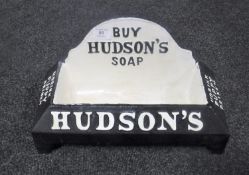 A cast metal Hudson Soap advertising tray