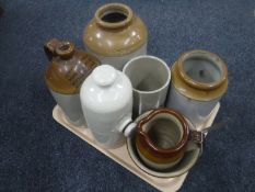 A tray of seven pieces of antique stoneware, flagon, storage jars,