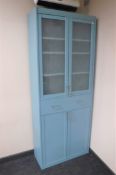 A painted pine Ikea bookcase fitted cupboard and drawer beneath
