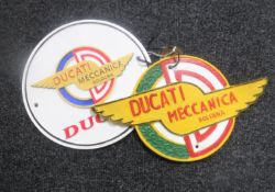 Two cast metal plaques "Ducati"