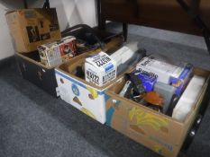 Four boxes of assorted power tools, wooden legs, washer fittings, taps,