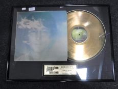 A framed 24ct gold plated John Lennon Imagine disc, No.