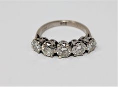 An impressive 18ct gold five stone diamond ring, the total diamond weight estimated at 2.