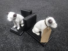 A pair of cast metal dog bookends