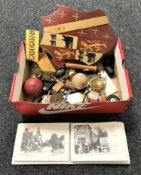 A box of armorial plaque, model making parts, wooden puzzle ball etc.