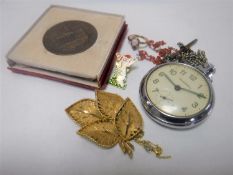 A Ingersoll pocket watch together with a costume brooch, lady's dress ring,