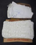 Two boxes of vintage linen including table covers and throws