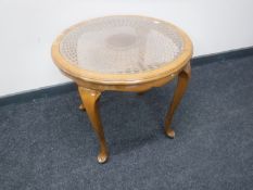 A bergere topped occasional table