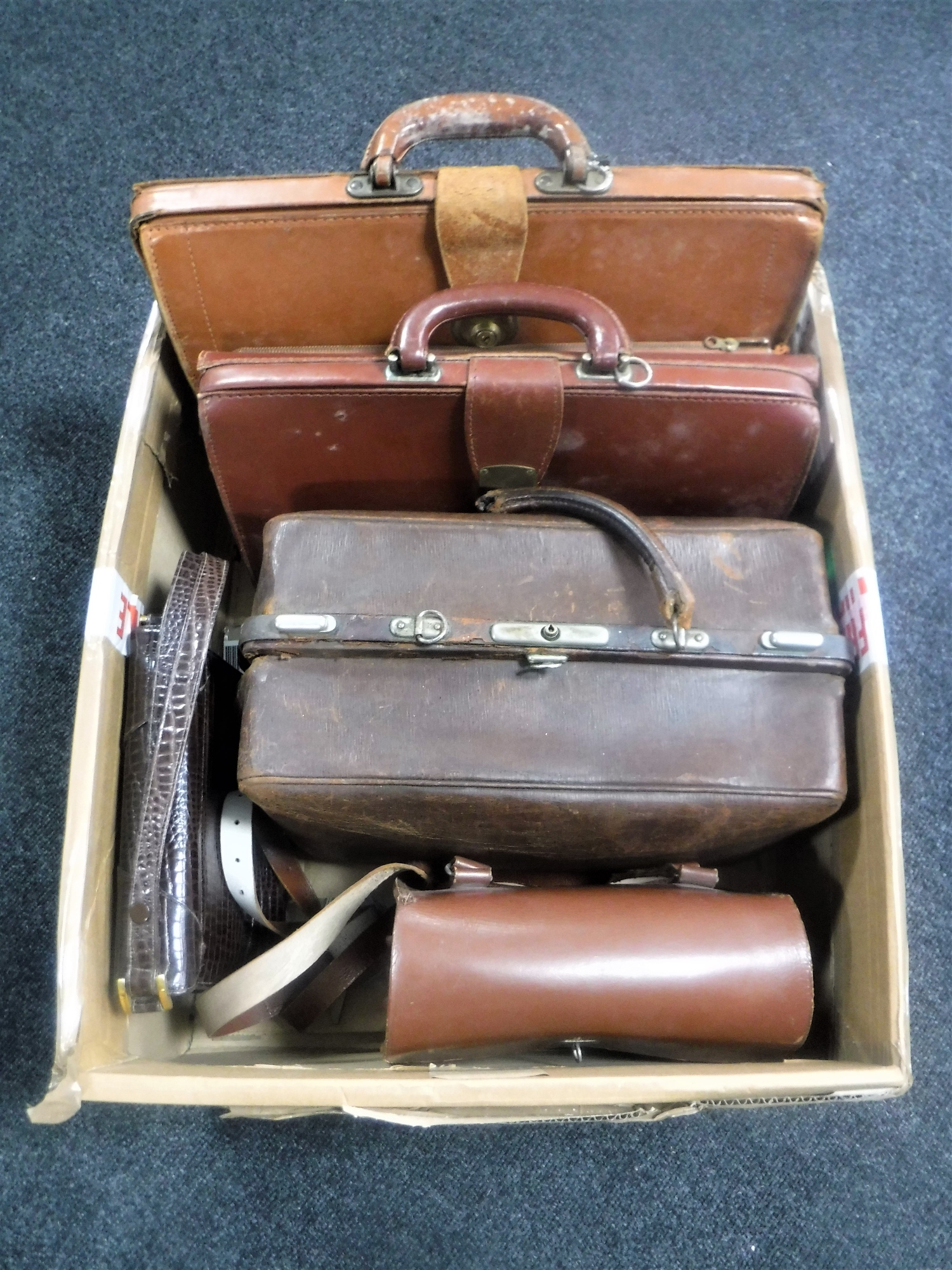 A box of vintage leather Gladstone bag,
