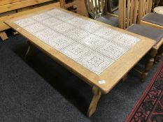 A Danish oak tiled top coffee table