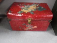 An early 20th century hand painted tin trunk