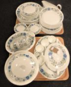 Two trays of fifty-five pieces of Wedgwood Clementine tea and dinner ware