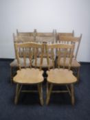 A set of six antique French pine kitchen chairs and a pair of similar chairs