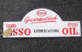 A cast metal plaque "Esso"