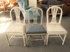 A pair of dining chairs together with an antique painted dining chair