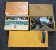 Three boxed Stanley woodworking planes and one other miniature plane