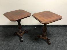 A pair of mahogany pedestal occasional tables