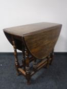 An early 20th century oak gateleg table