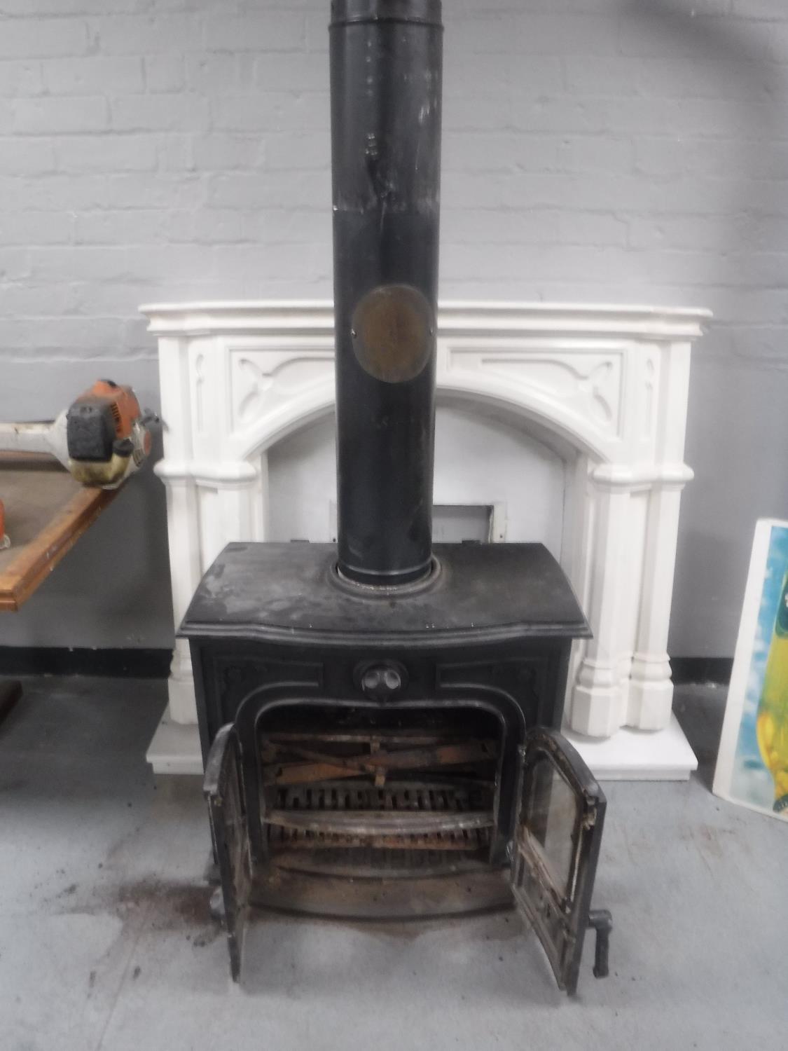A cast iron log burner with flue