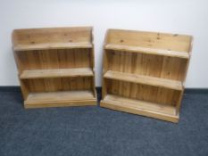 A pair of pine open book shelves