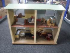 A mid 20th century Mettebo doll's house with furniture