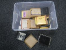 A box of vintage glass negatives