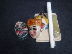 A tray of four papier mache masks, three Chinese scent bottles,