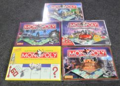 Five Monopoly board games - Australia, Edinburgh, Oxford,