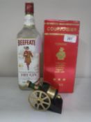 Two bottles - Courvoisier Luxe Cognac 70cl (boxed), together with a Courvoisier cognac 'cannon',