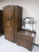 A 20th century oak single door wardrobe and dressing chest