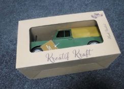 A boxed metal model of a Land Rover