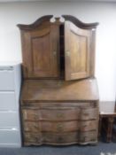 A 19th century continental oak bureau bookcase