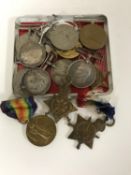 A collection of British First and Second World War Medals comprising;