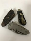 Three military issue early 20th century pocket knives CONDITION REPORT: Top-right