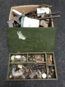 A box of assorted vintage hand tools and a wooden box of metal fittings