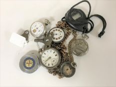 A collection of pocket watches, watch chains,