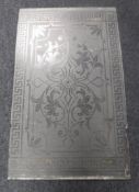 An antique etched glass window panel CONDITION REPORT: 67cm by 109cm.
