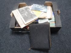 A box containing Victorian photograph album, books,