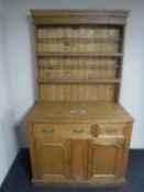 An antique pine kitchen dresser