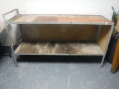 A metal framed two tier work bench