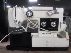 A New Home combi electric sewing machine with foot pedal