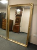 A gilt framed overmantel mirror,