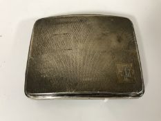 A curved silver cigarette case, Birmingham 1927, initialled to the front 'DJ', 126.9g.