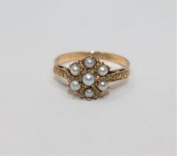 A 9ct gold pearl cluster ring, size N1/2 CONDITION REPORT: 2.