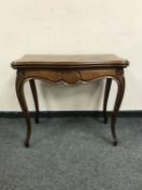 A Victorian mahogany serpentine front card table,