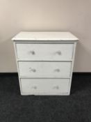 An early 20th century painted pine three drawer chest