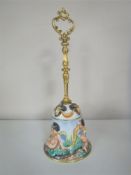 A Capodimonte brass handled bell