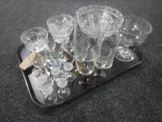 A tray containing assorted glass ware including a set of five thistle liqueur glasses,
