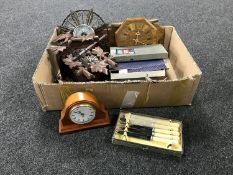 A box containing Black Forest style cuckoo clock, wall clock, mantel clock, barometer,