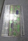 Three antique narrow stained glass windows and two further leaded glass windows